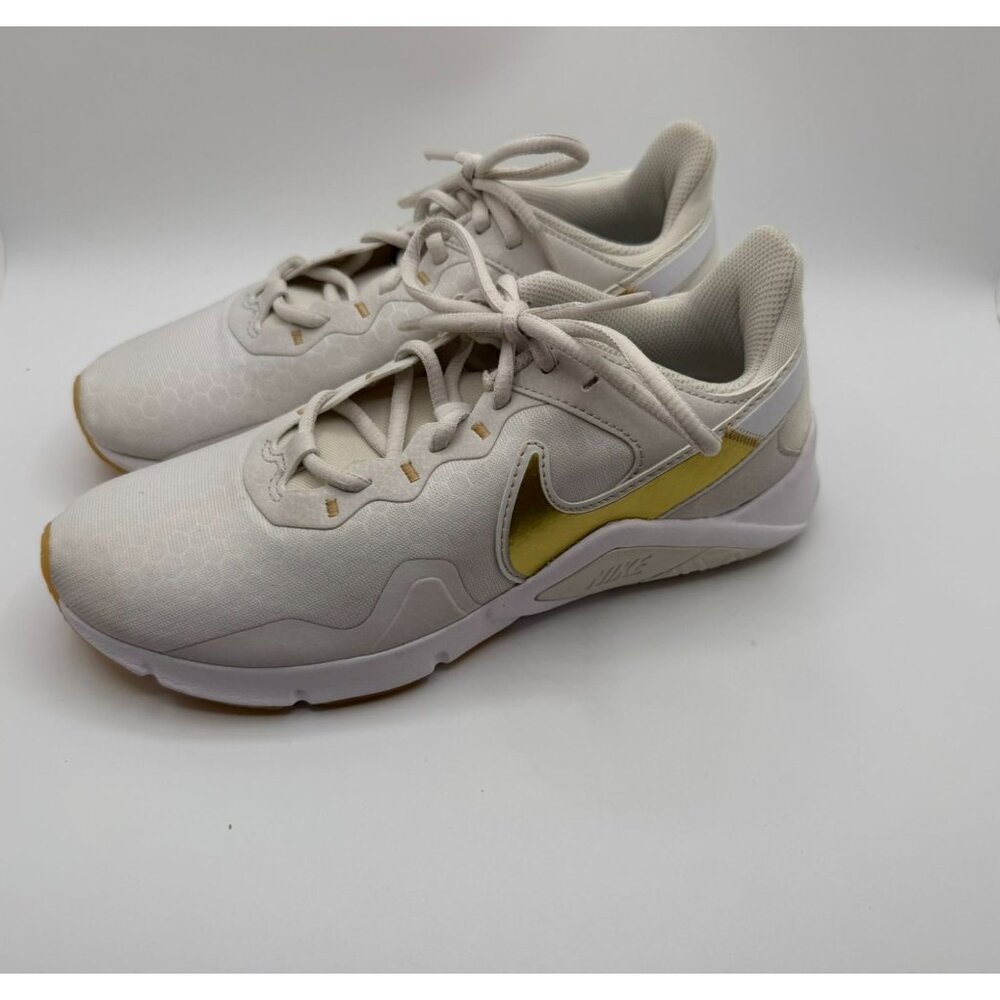 Nike Legend Essential 2 Trainers Women Size 7.5 Platinum Tint/Metallic Gold Star